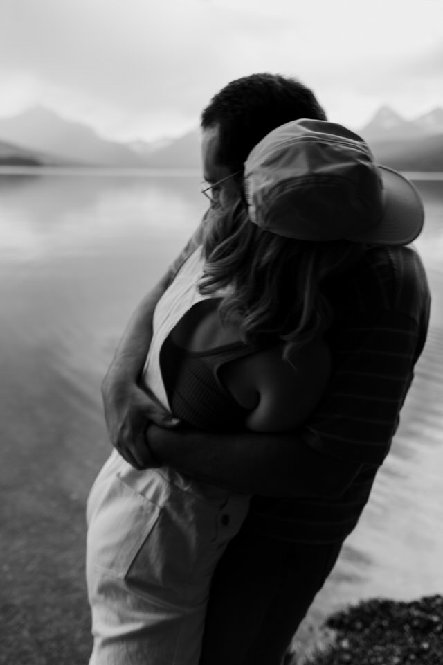 black and white engagement photo at mountains