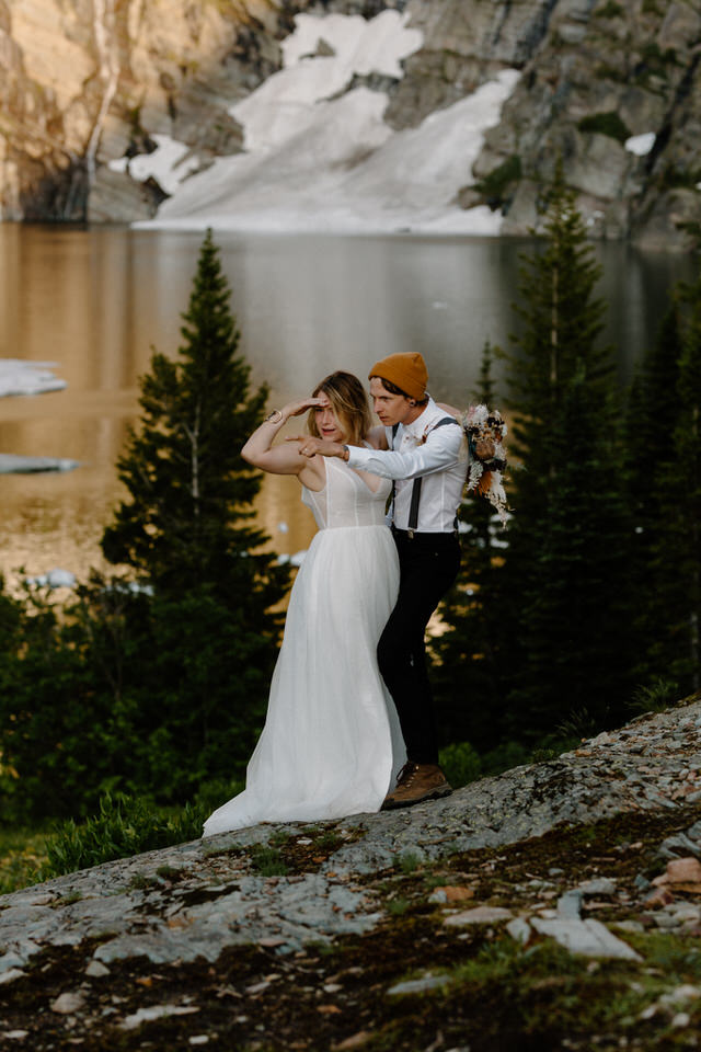 groom points out mountain goat in montana