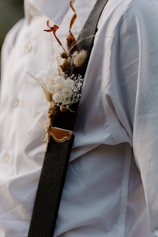 small handcrafted dried grooms boutonniere