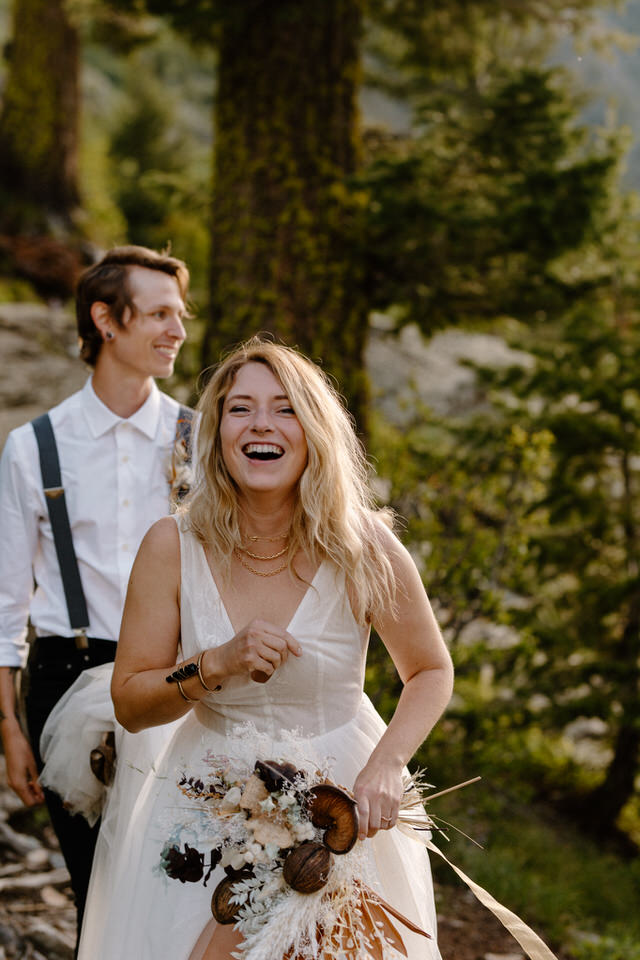 Bride laughs wearing minimalist elopement dress
