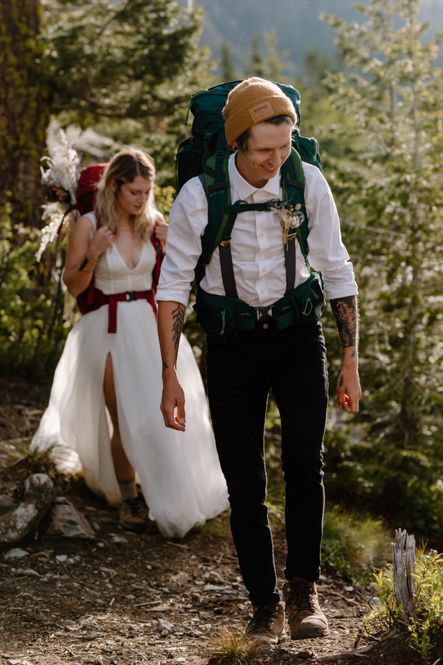Couple backpacks during Montana elopement
