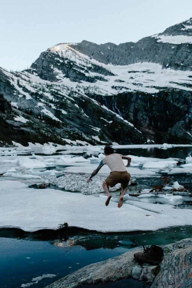 grooms jumps into glacial lake