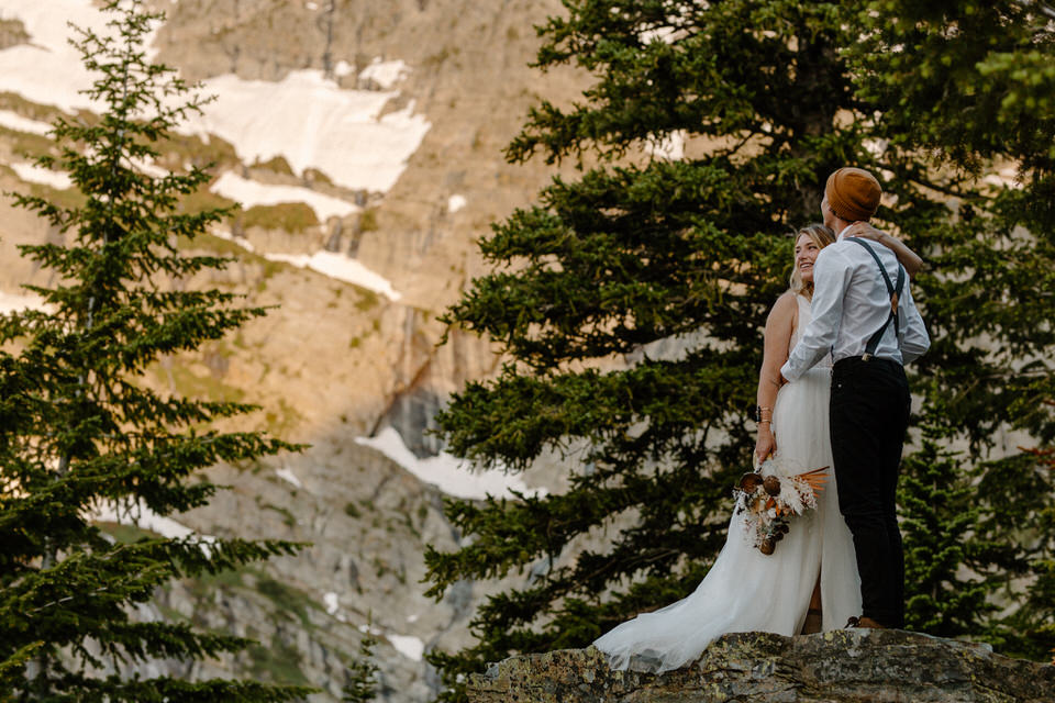 couple looks at mountain views in montana