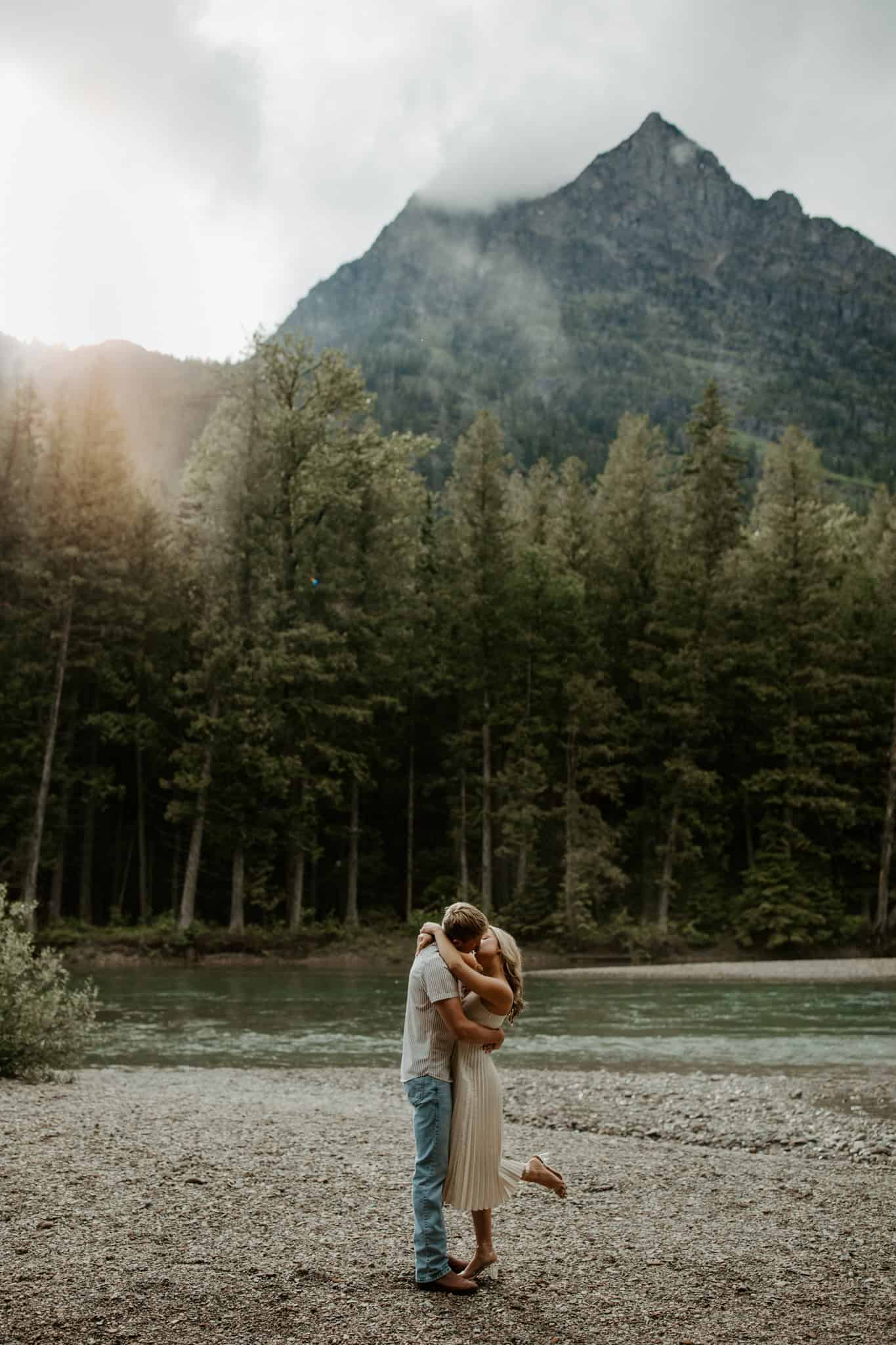 wedding couple overlooking Avalanche Gorge Glacier National Park